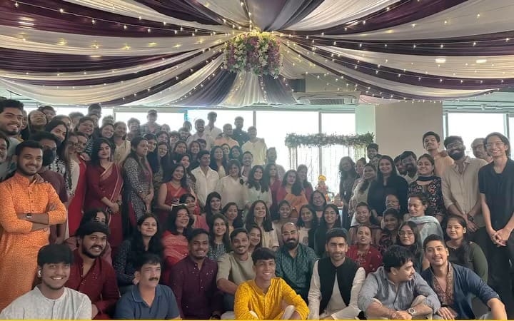 The whole SoCheers office dressed up for Diwali, under the fairy lights