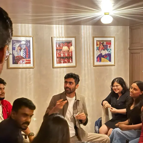 The SoCheers team in a meeting