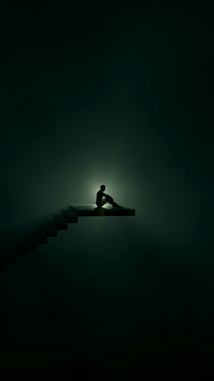 A lone figure sitting on steps in a pool of light